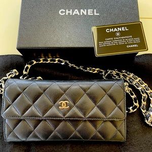Authentic Chanel leather Wallet with chain.